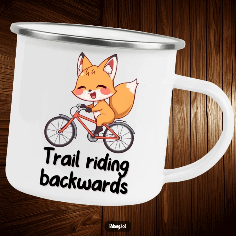 Funny fox camping mug with a giggling fox riding a bicycle backward with a playful wink, durable and witty.