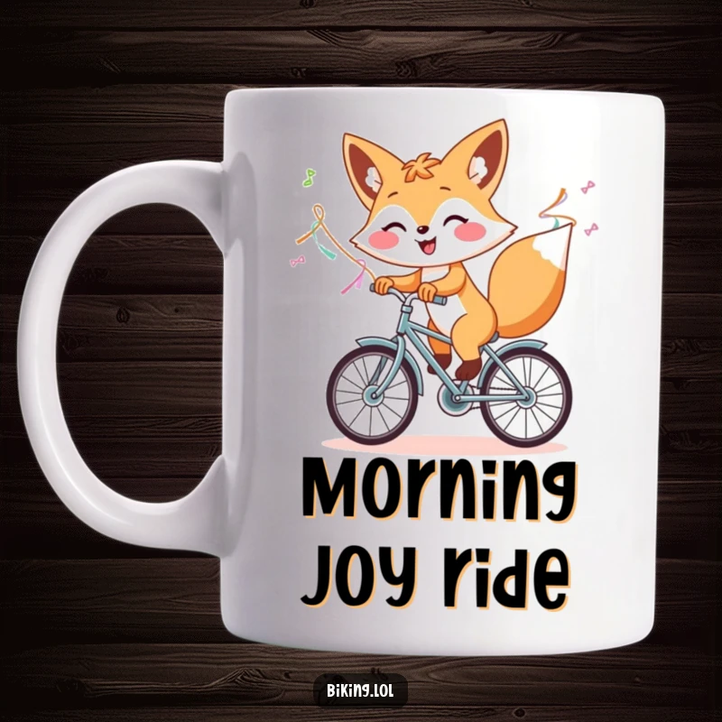 Funny mug showing a cheerful fox happily riding a bicycle with colorful streamers flying, symbolizing joy and freedom.
