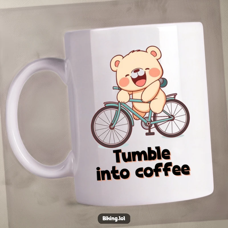 Funny mug featuring a laughing bear cub comically tumbling off a bicycle seat with a very silly face.