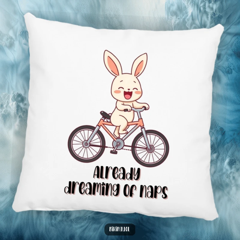 Funny bunny character in the midst of a wheelie on a tiny bike, laughing heartily, adorning a soft and plush pillow.