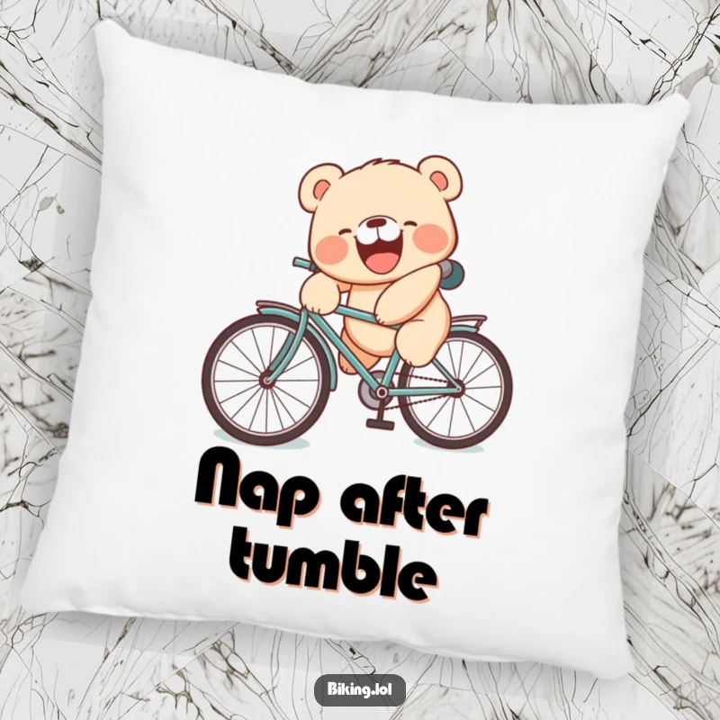 Funny pillow featuring a laughing bear cub with a silly face tumbling off a bicycle, adding whimsy.