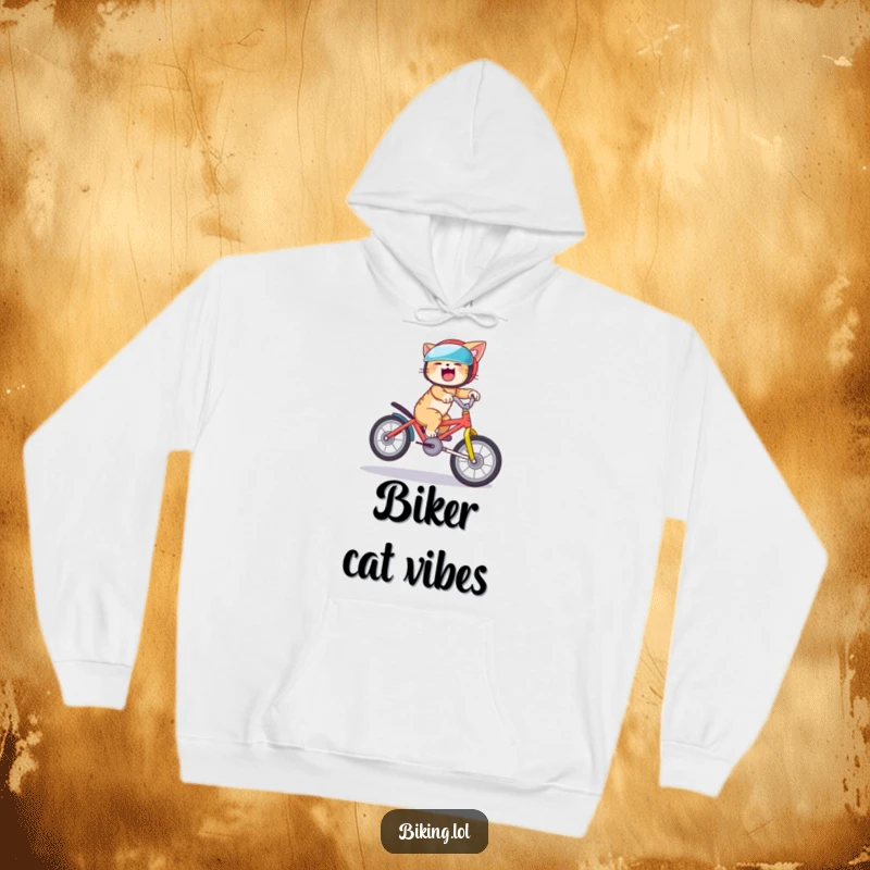 Funny cat hoodie featuring a giggling cat attempting a bike wheelie, offering warmth and a dose of comic relief.
