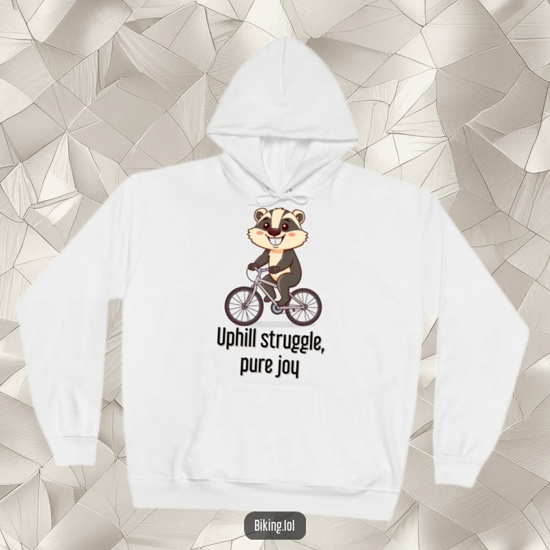 Funny hoodie featuring a determined badger smiling while cycling uphill, perfect for a comical outdoor adventure.