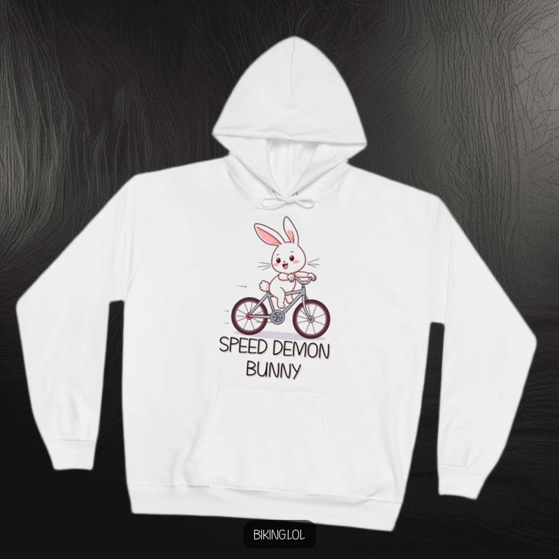 Funny hoodie depicting a joyous bunny speeding downhill on a small bicycle, ears flying in the wind, expressing utter happiness.