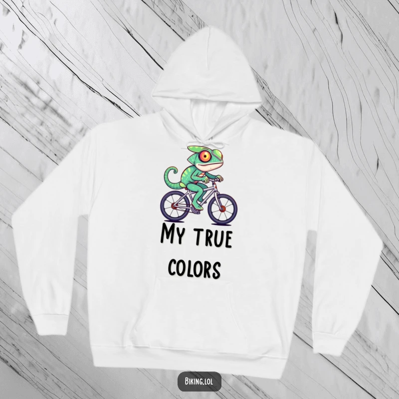 Funny chameleon character, a streak of changing colors, riding a fast bicycle, featured on a cozy hoodie.