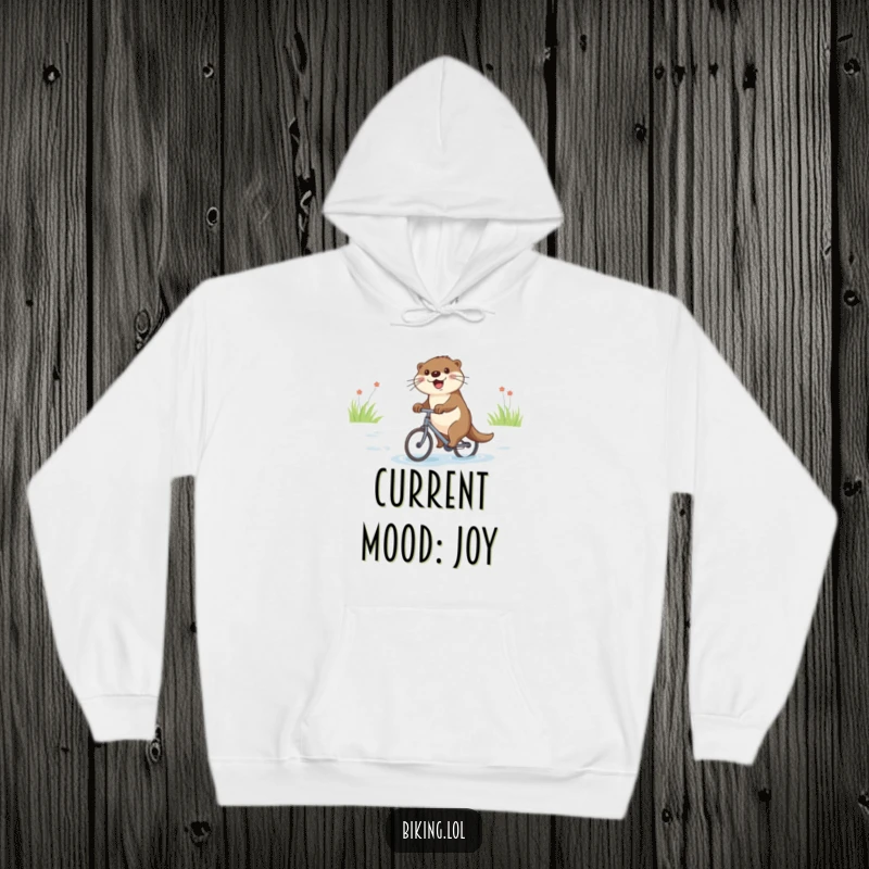 Funny hoodie featuring a happy otter cycling on a tiny bike down a river, cozy and cute.