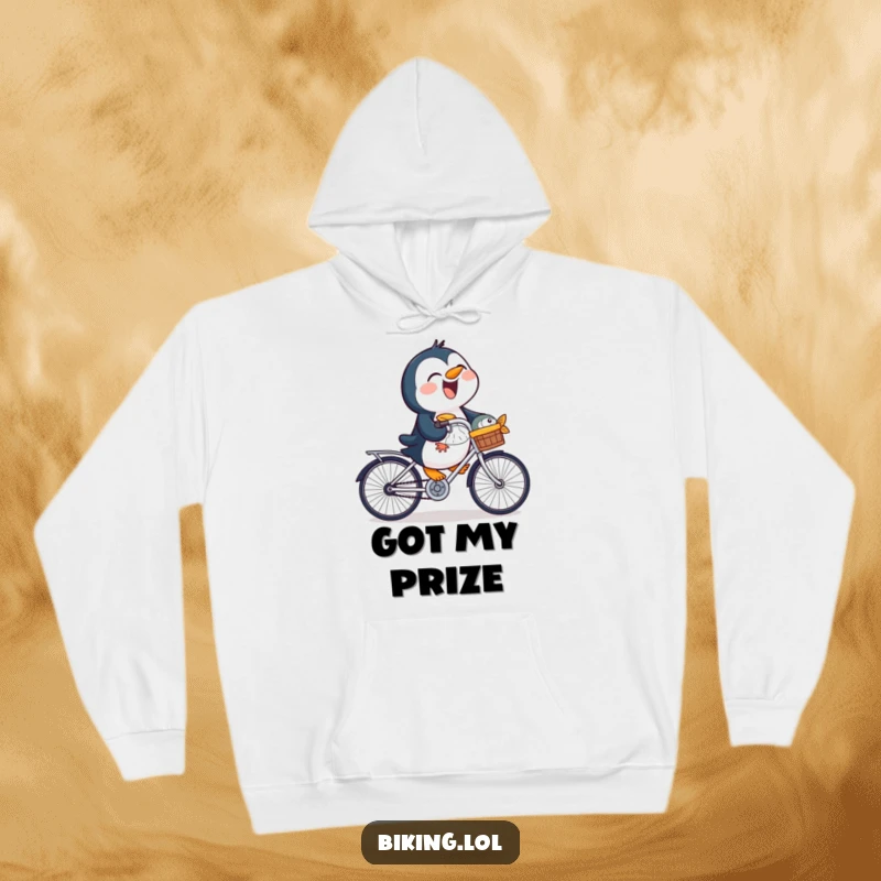 Funny penguin hoodie featuring a laughing bird on a bicycle with a fish in its basket, a cozy and humorous item.