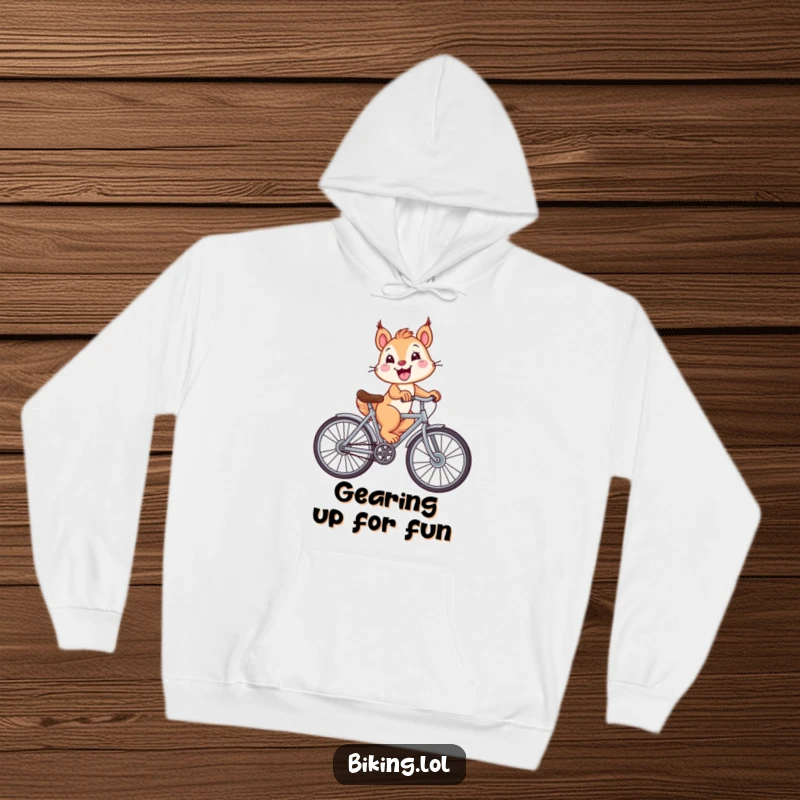 Funny squirrel on a bicycle with giant wheels and a huge smile, featured on this cozy and comical hoodie.