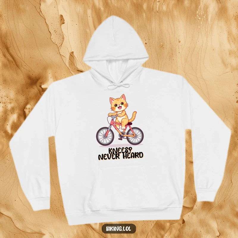 Funny cat hoodie featuring a stylish feline performing a wheelie on a colorful bike, combining warmth and humor.