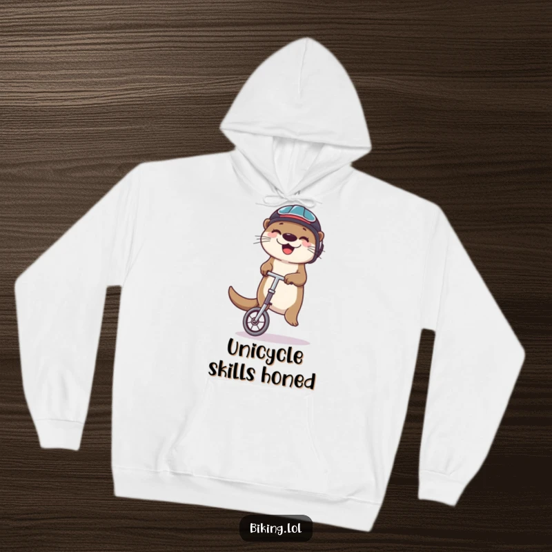 Funny otter hoodie featuring a happy otter wearing a helmet, balancing on a unicycle and juggling multiple items.