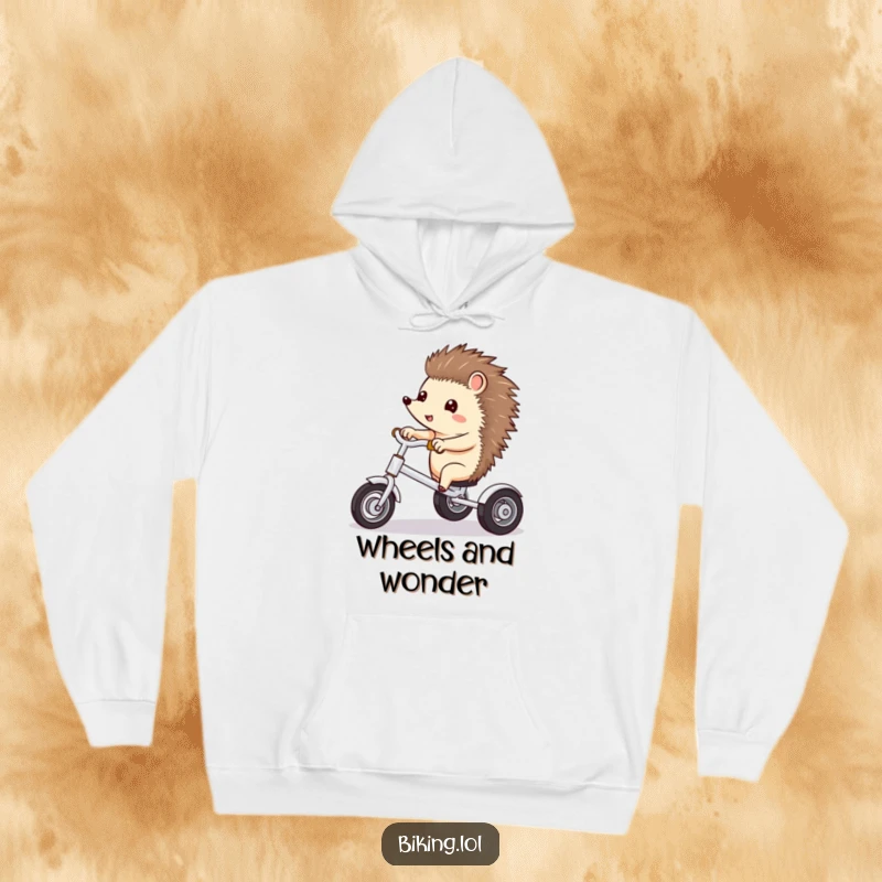 Funny hoodie with a curious hedgehog pointing ahead while riding a tricycle with excitement.