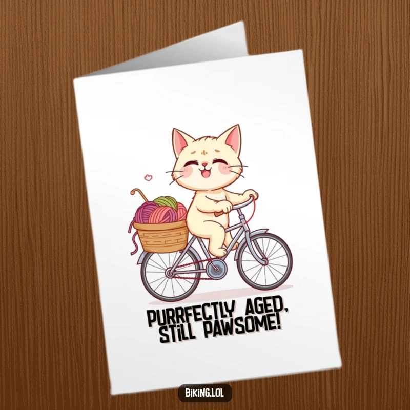 Funny Free Printable Birthday Card: Giggling cat pedaling a bike loaded with yarn, ready to deliver birthday wishes with a smile.