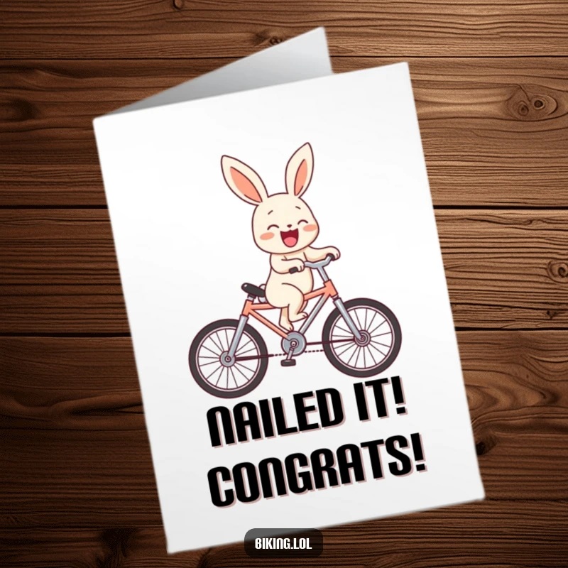 Funny Free Printable Congrats Card: A laughing bunny expertly (or not!) does a wheelie on a small bike, celebrating success.