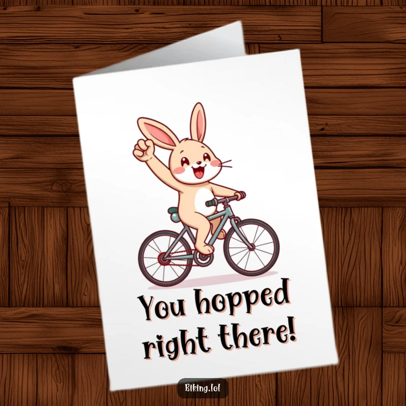Funny Free Printable Congratulations Card: Cheerful rabbit pumping its arm, cycling uphill with great effort, celebrating a victory.