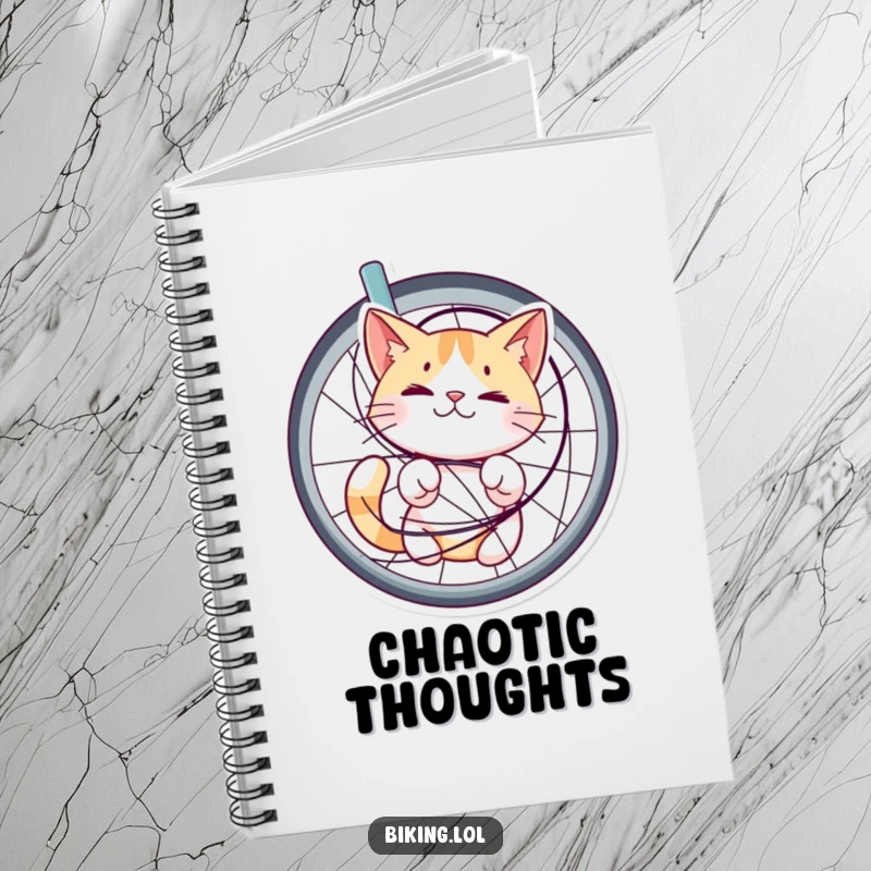 Funny notebook with a cat tangled in bicycle spokes, looking bewildered but happy, encouraging creative writing with a humorous and charming design.