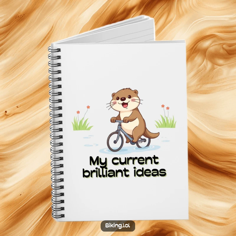 Funny notebook with a joyful otter riding a small bicycle down a river, for writing.