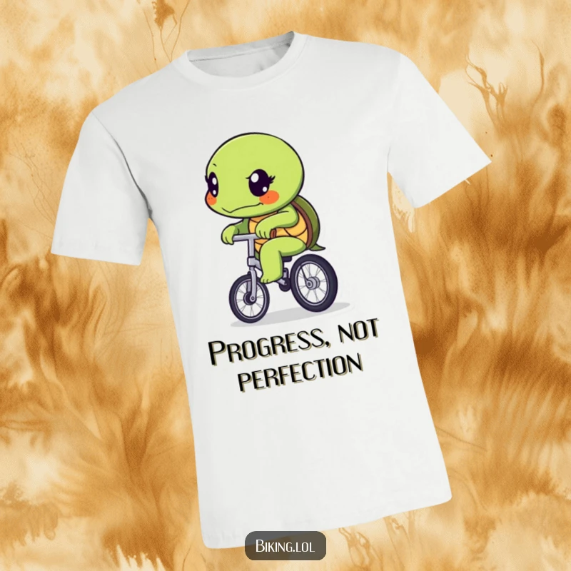 A determined funny turtle on a unicycle, moving slowly but surely, printed on a comfortable and humorous t-shirt.