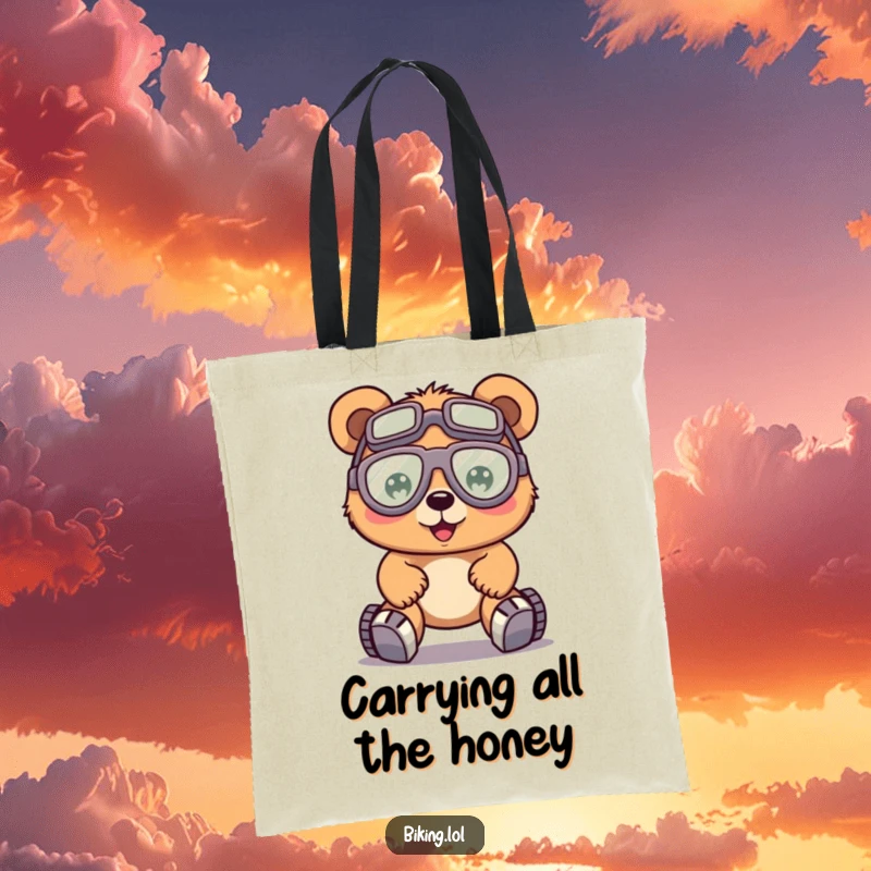 Funny bear wearing goggles, pedaling a bike hard, on a stylish tote bag, for carrying essentials.