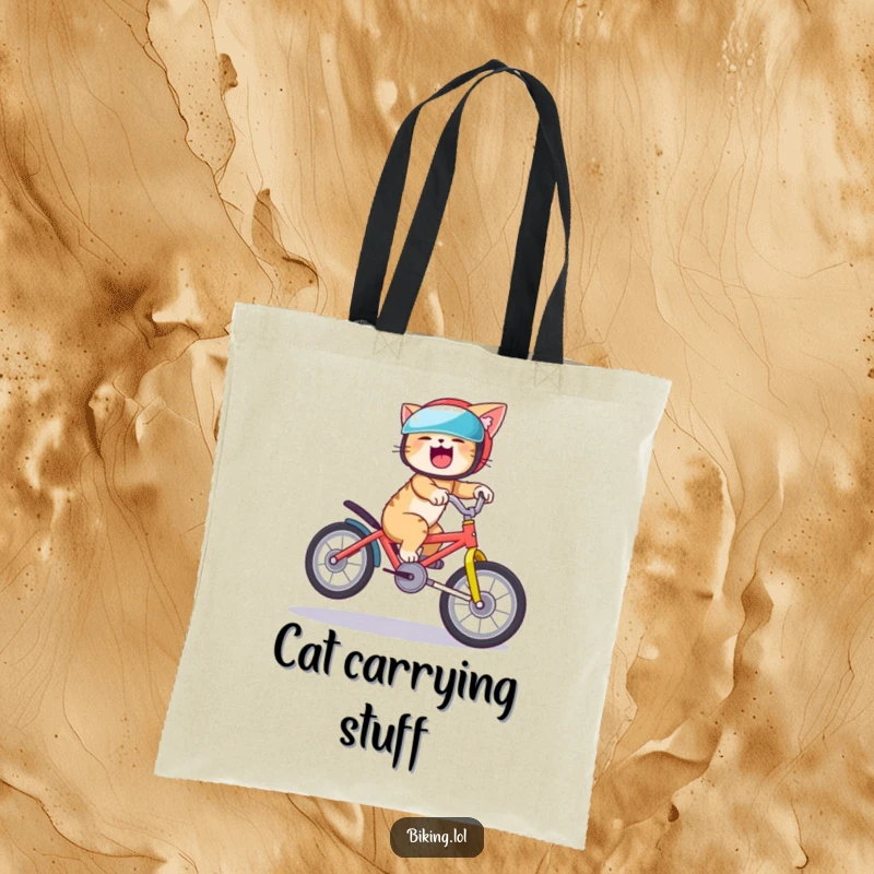 Funny cat tote bag showcasing a giggling cat doing a bike wheelie, ideal for market trips and chuckles.