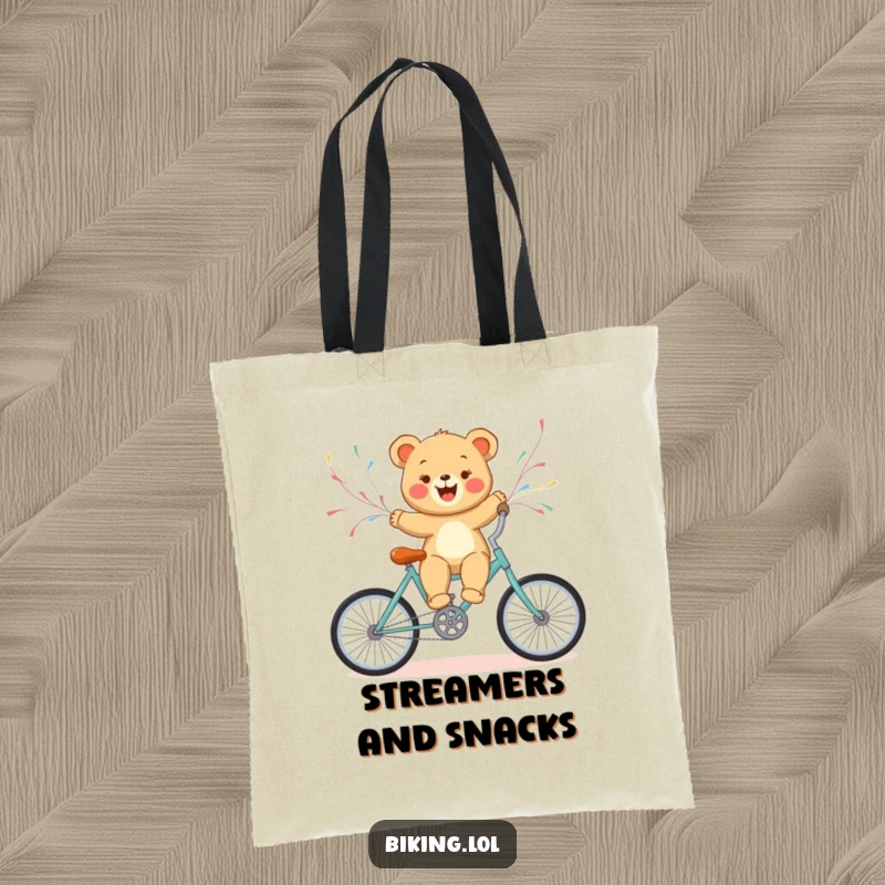 Funny bear cub bicycling with streamers, a cute and functional tote bag for carrying essentials with a smile.